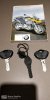 3 claus i llibre instruccions BMW.jpg
