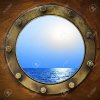 9920107-Boat-Bullauge-mit-Blick-auf-das-Meer-hautnah-Lizenzfreie-Bilder[1].jpg