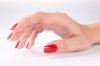 mujer--mano--esmalte-de-unas-rojo--las-manos_3219695.jpg