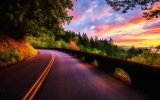 beautiful-sunset-scenery-forest-trees-road-clouds-colors-wallpaper-preview.jpg