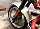 R100 ruedea del izq.jpg
