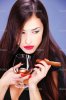 depositphotos_8605618-stock-photo-woman-and-cigar.jpg