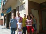 con Magic, su familia y mi hija, Agosto de 2006